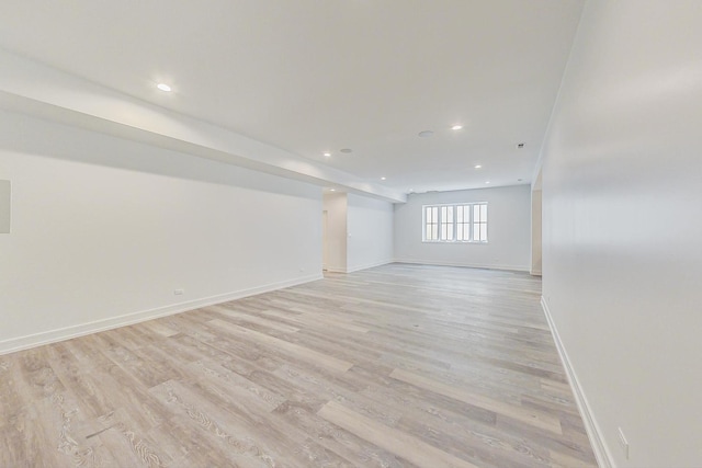 unfurnished room with light hardwood / wood-style floors