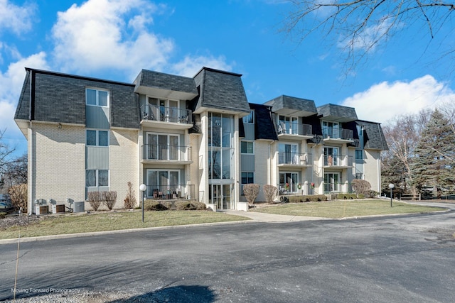 view of property with central AC unit