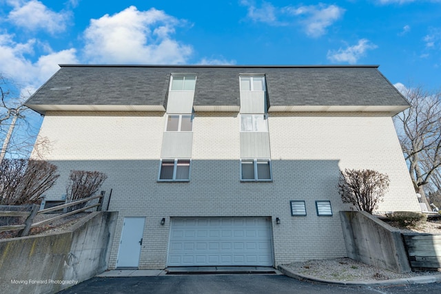 exterior space with a garage