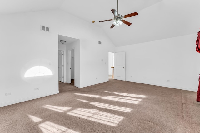 unfurnished living room featuring high vaulted ceiling, ceiling fan, and carpet