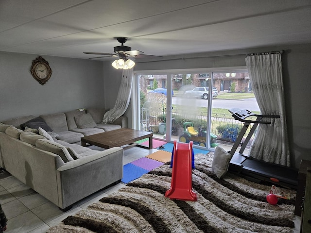 tiled living room with ceiling fan