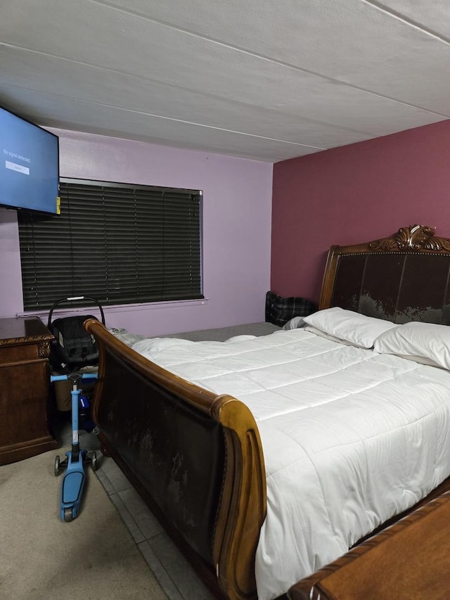 bedroom featuring carpet flooring