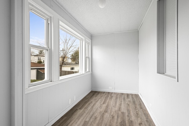 empty room featuring wood-type flooring