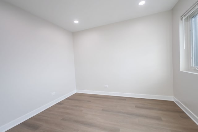 spare room featuring light hardwood / wood-style flooring