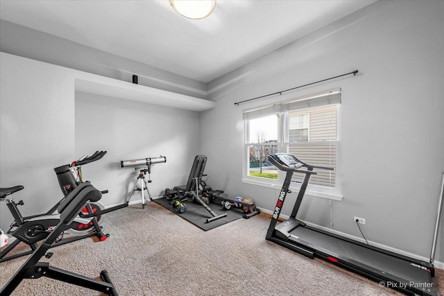 exercise room with carpet floors