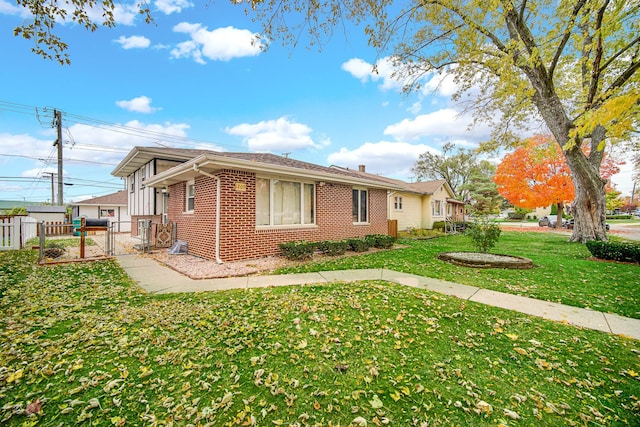 view of front of home with a front yard