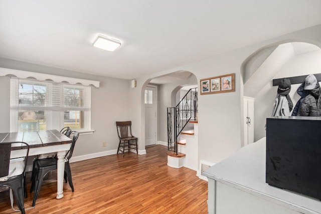 home office with hardwood / wood-style floors