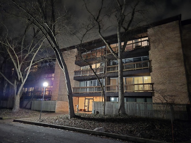 view of property exterior at twilight