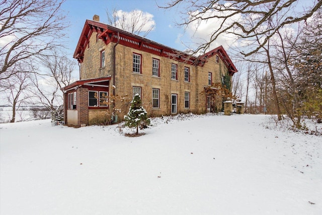 view of snow covered property