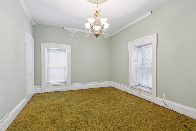 carpeted spare room with a chandelier and crown molding