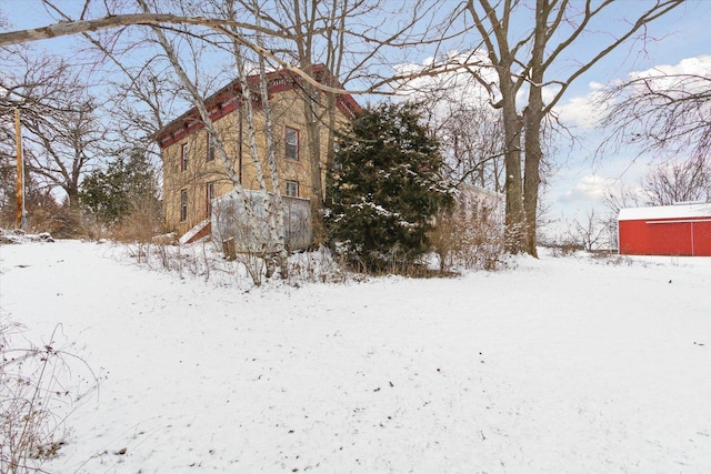 view of snow covered property