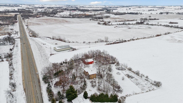 snowy aerial view with a rural view