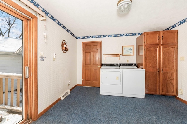 laundry room with dark colored carpet and separate washer and dryer