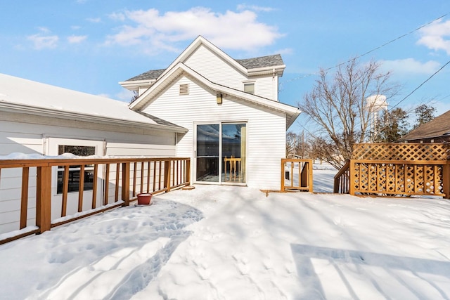 view of snow covered deck