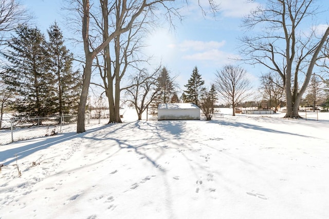 view of yard covered in snow