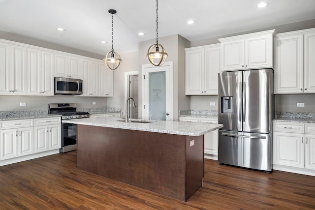 kitchen featuring white cabinets, dark hardwood / wood-style flooring, sink, and stainless steel appliances