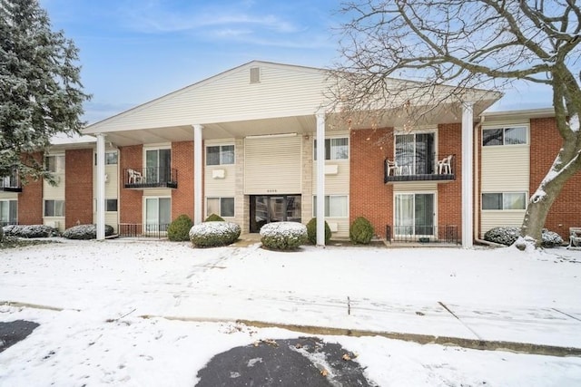 view of snow covered property