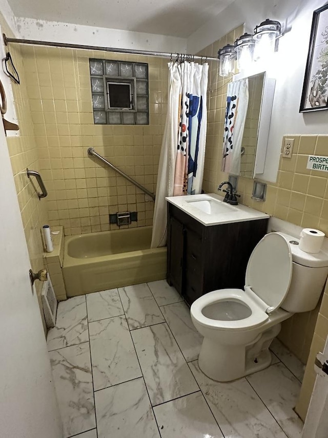 full bathroom with vanity, decorative backsplash, toilet, tile walls, and shower / tub combo with curtain