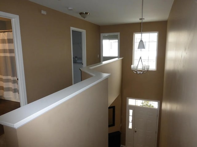 entrance foyer with a chandelier