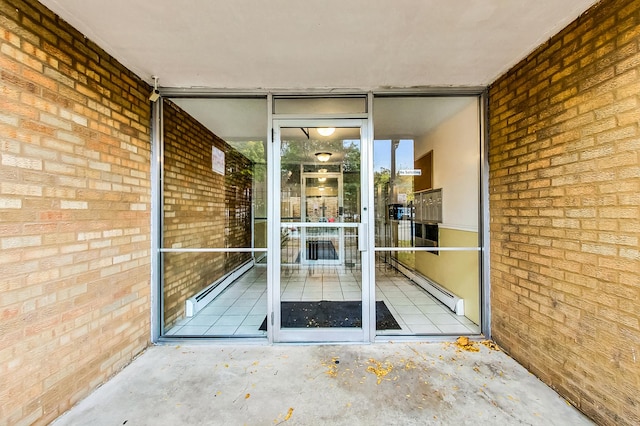 doorway to property featuring a baseboard radiator