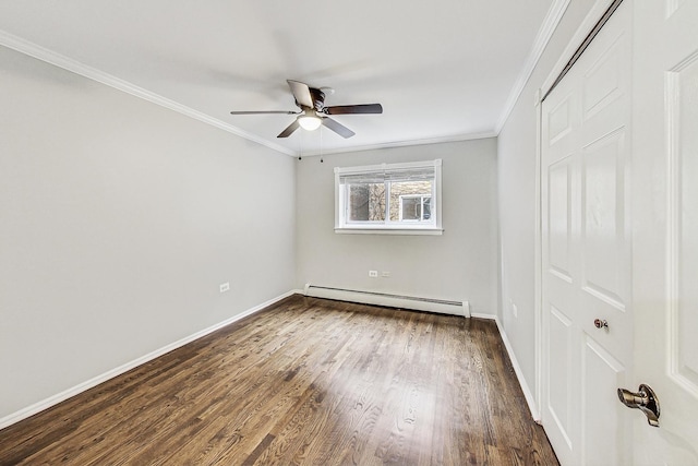 unfurnished bedroom with ceiling fan, dark hardwood / wood-style floors, ornamental molding, and baseboard heating