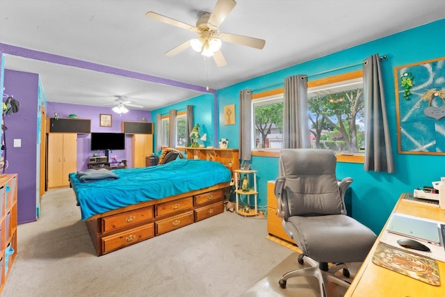 bedroom featuring light carpet and ceiling fan