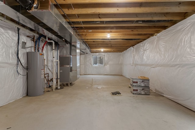 basement with electric water heater and heating unit