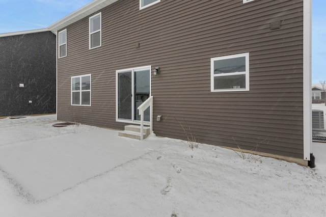 view of snow covered property