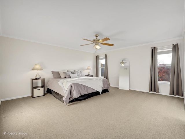 bedroom with carpet, ceiling fan, and ornamental molding