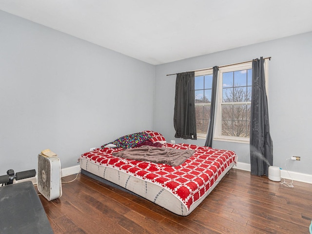 bedroom featuring dark hardwood / wood-style floors