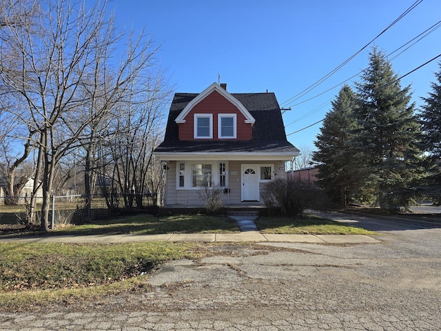 bungalow-style home with a porch