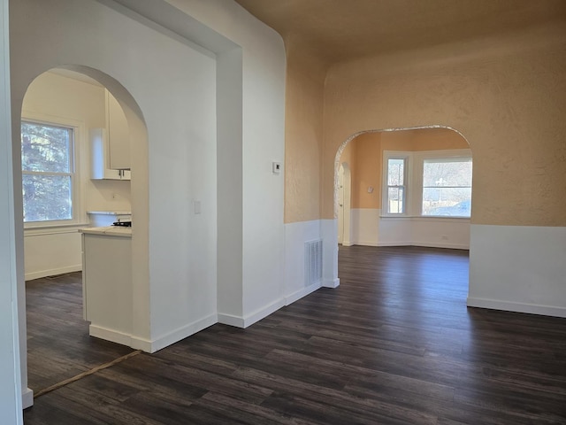 hall featuring dark wood-type flooring