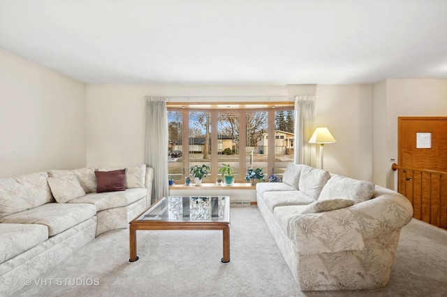 living room featuring light colored carpet