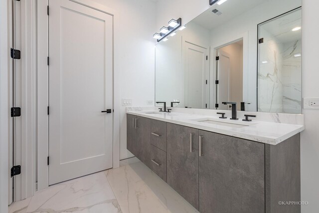 bathroom featuring vanity and a shower