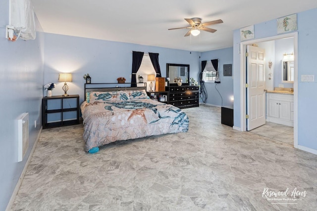 bedroom with ceiling fan and connected bathroom