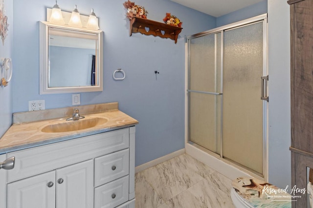 bathroom with vanity and walk in shower