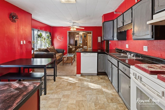 kitchen featuring exhaust hood, white appliances, ceiling fan, and sink