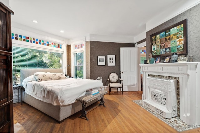 bedroom featuring hardwood / wood-style floors