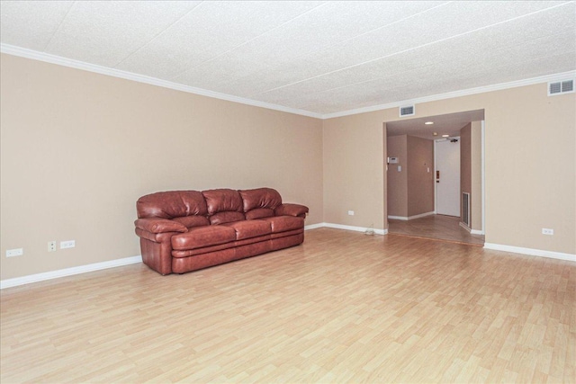 living room with wood-type flooring and crown molding