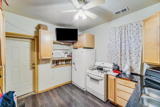 kitchen with ceiling fan, light brown cabinets, sink, dark wood-type flooring, and white appliances