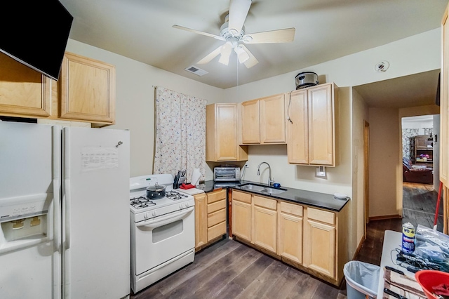 kitchen featuring light brown cabinetry, dark hardwood / wood-style flooring, white appliances, ceiling fan, and sink