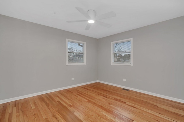 unfurnished room featuring ceiling fan and light hardwood / wood-style floors