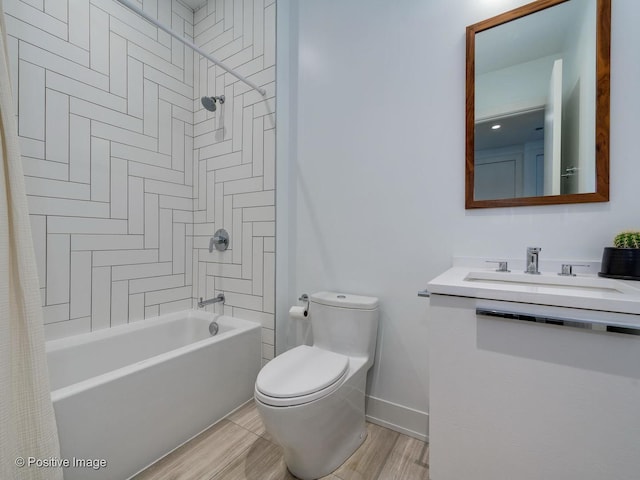 full bathroom with toilet, shower / bath combination with curtain, hardwood / wood-style floors, and vanity