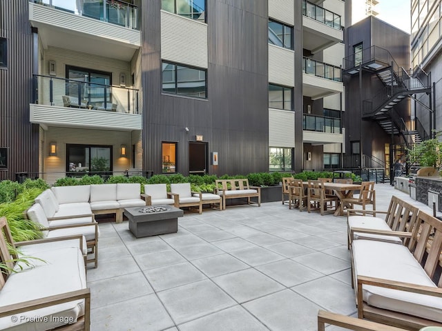 view of patio with an outdoor fire pit