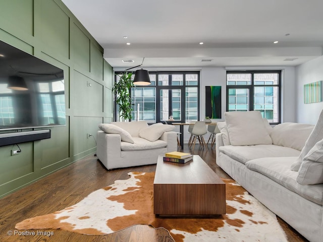 living room with dark wood-type flooring