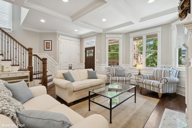 living room with beamed ceiling, wood-type flooring, crown molding, and coffered ceiling