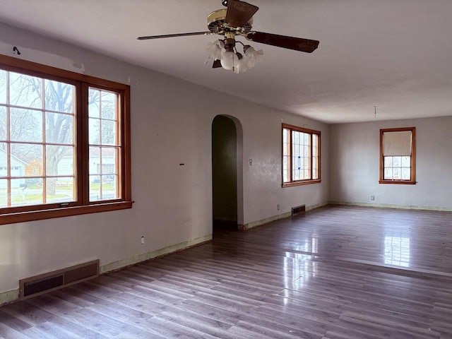 spare room with ceiling fan and light hardwood / wood-style floors