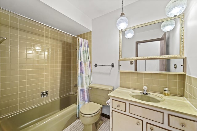 full bathroom featuring vanity, backsplash, tile patterned flooring, toilet, and shower / tub combo with curtain