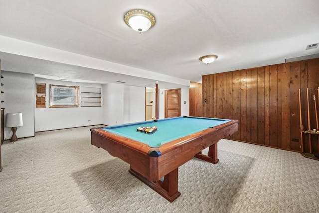 recreation room with wooden walls, light carpet, and billiards