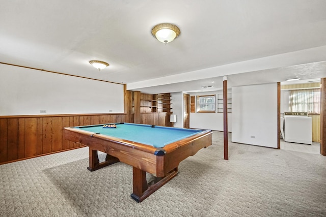 game room with wood walls, light colored carpet, billiards, and washer / clothes dryer